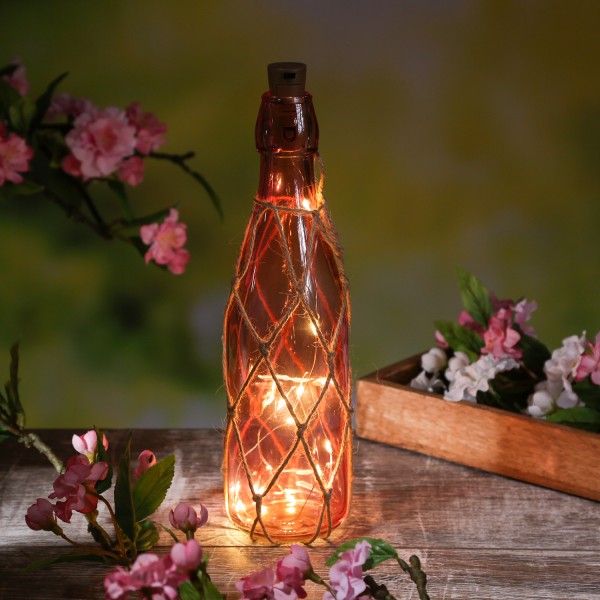 LED Dekoflasche mit Juteseil und LED Drahtlichterkette - Leuchtflasche - H: 28cm - dunkelrosa